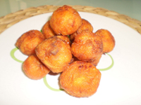 Bolas de boniato con capa crocante y rellenas con tasajo, picadillo de res o vegetales